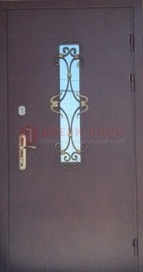 Металлическая дверь со стеклом и ковкой ДСК-77 в Кирове